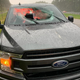 Illustration for article titled Lightning Strike Blasts Hunk Of Highway Through Ford Windshield, Injuring Two